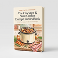 The Crockpot & Slow Cooker Dump Dinners Book standing upright on a light gray background. The book cover features a cream-colored design with black text and an illustration of a slow cooker filled with stew, surrounded by carrots, onions, and a red checkered cloth.
